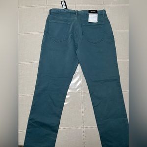banana republic slim traveler pant in light blue